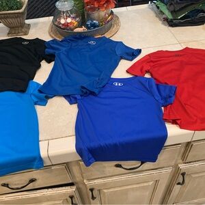 Five (5) size 4 boys under Armour shirt sleeve shirts